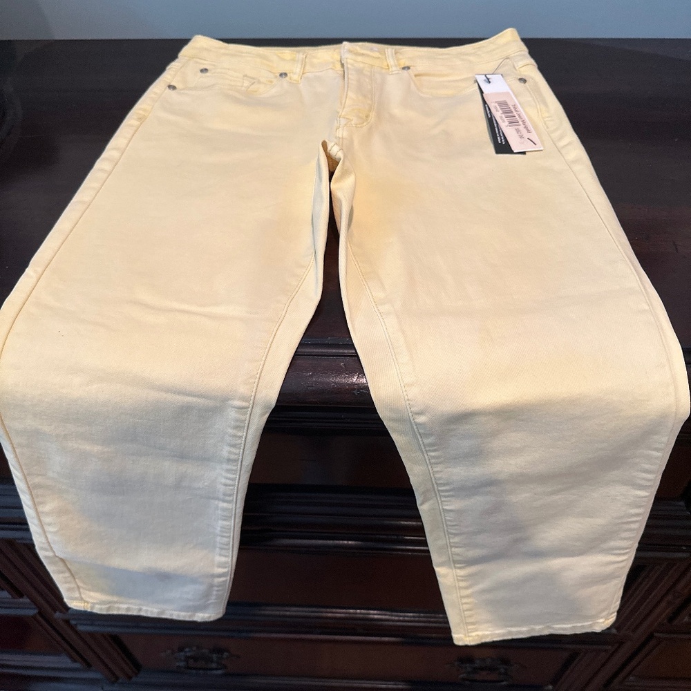 Faded look yellow jeans
